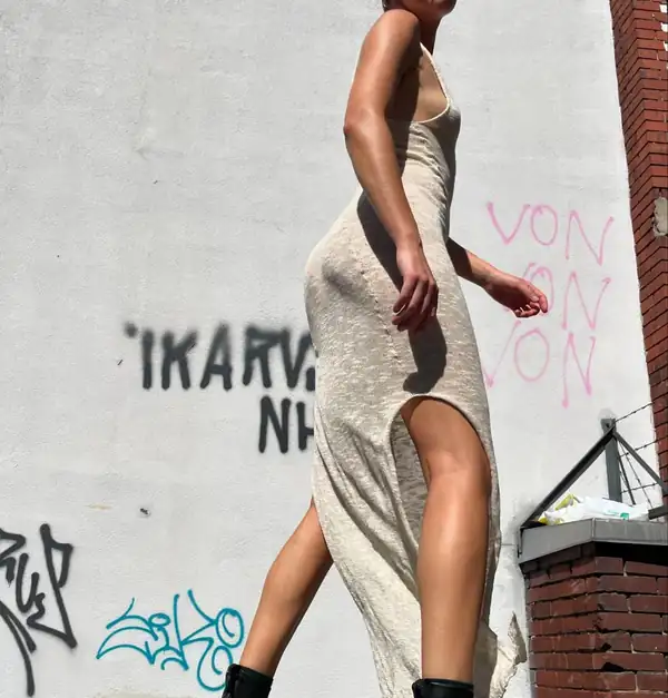 Mid-stride: the same dress in motion.
